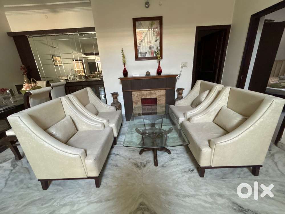 4 seater sofa with glass table