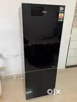 Haier 265 liter Glass door Bottom mount refrigerator