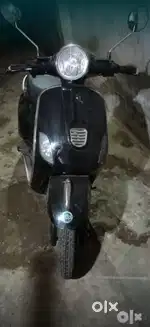 Vespa designed electric scooty