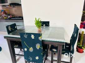 4 seater dining table with glass top