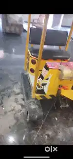 This is a toy crane for gaming zones