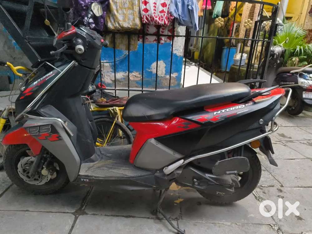 I m selling my TVS Ntorq 125 Red & Black Blutooth Race Edition