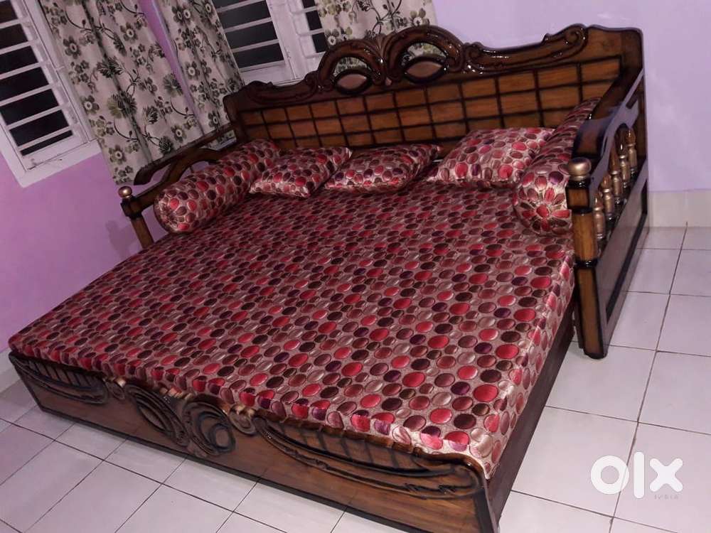 Teak wood sofa cumbed at reasonable price