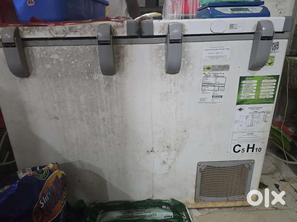 A 1year old 270 litre deep fridger and a tea stall for sale