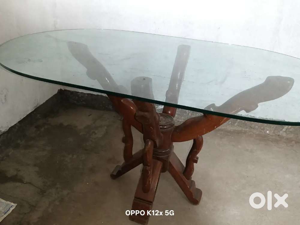 Dining table and wooden cupboard and chair