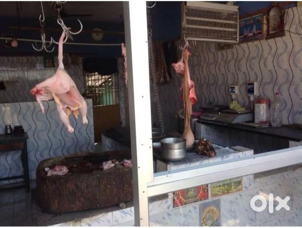 Neeer Butcher for chicken shopகறி வெட்டுபவர்