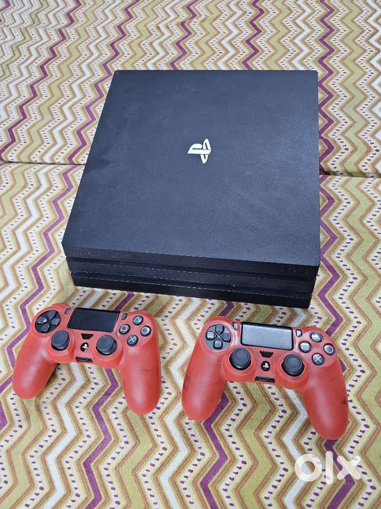 Want to sell my ps4 pro 1tb with 2 controllers & 1 game