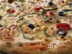 Pizza Burger cook in Cloud kitchen