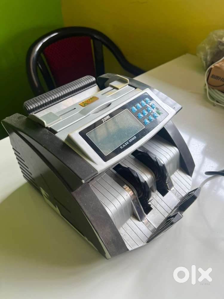 MONEY COUNTING MACHINE