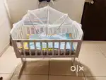The item in image is a babyhug joy swing cradle with mosquito net key