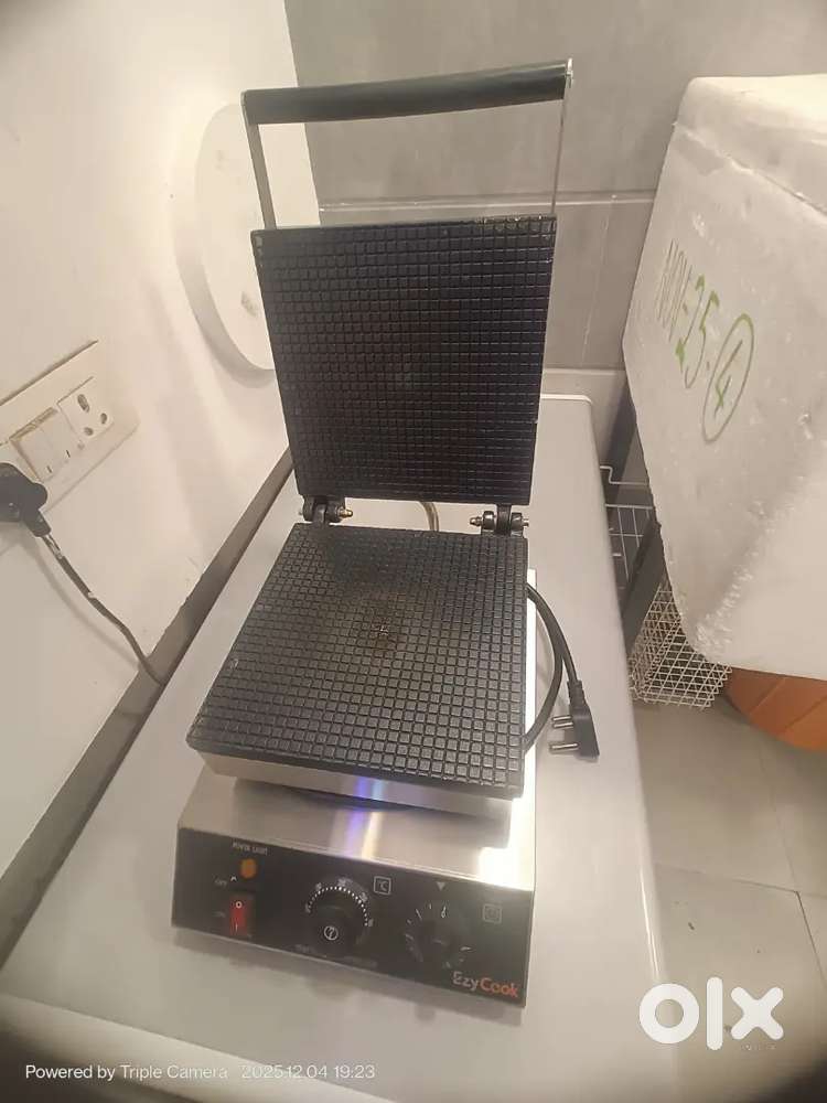 Waffle cone maker and chocolate machine.