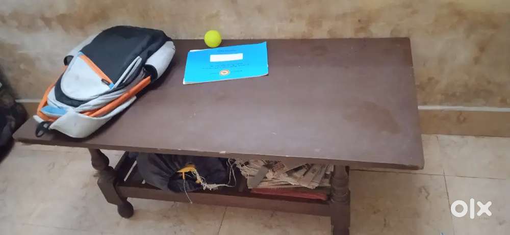 Double bed and wooden table