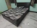 Bed with cupboard and dressing table