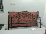 Wooden and steel  foldable cot.
