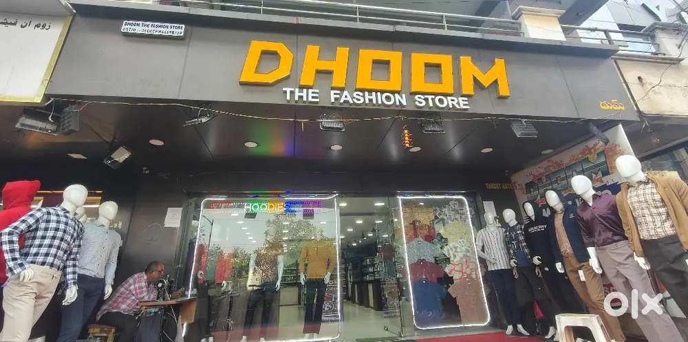 Salesman at clothing store