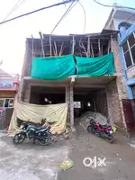 Front facing (on road) commercial building with two side road