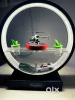 VegeBox LED showpiece with mini helicopter, Dodge & GTR cars.”