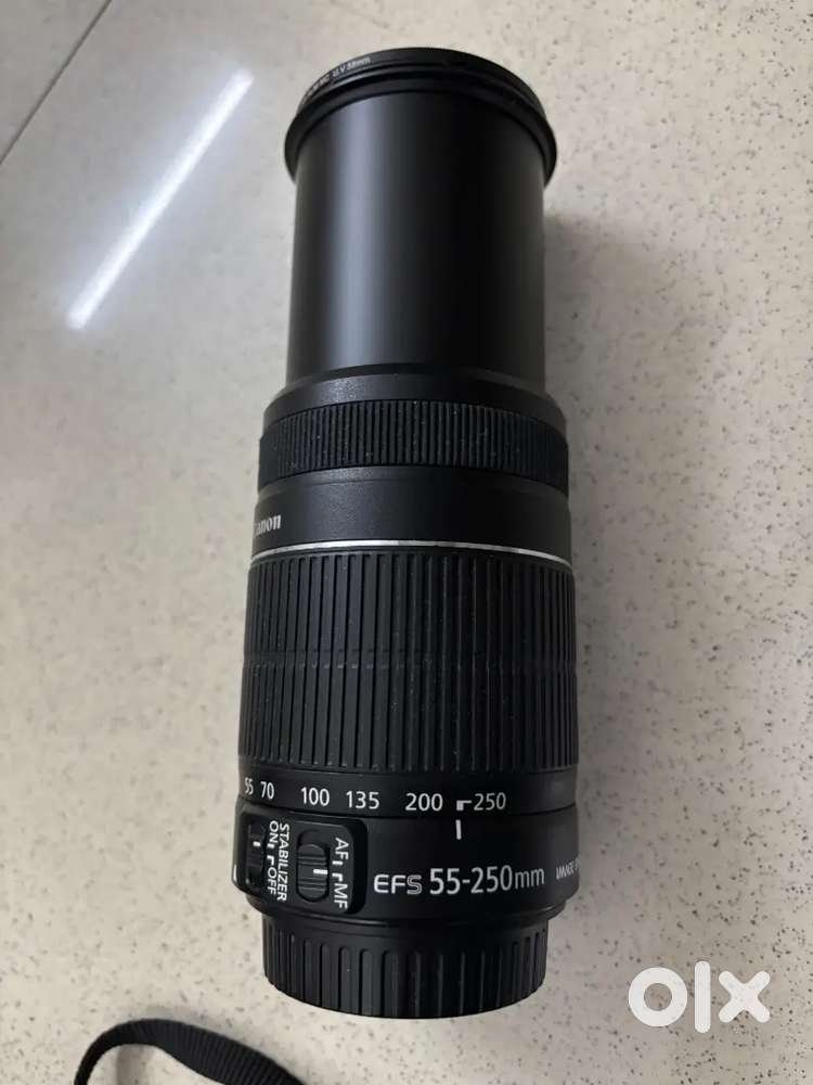 Canon 1500D DSLR + 18-55 and 55-250mm lenses