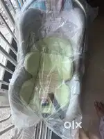 Star n daisy Baby cot green color