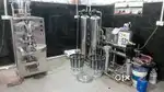 1000 ltr steel ro plant with steel pouch packing machine