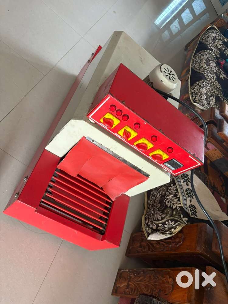 Shrink wraping machine