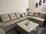 9 Seater Sofa with table. 1 year old.
