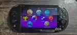PlayStation Vita with Nyko Power Grip and Box