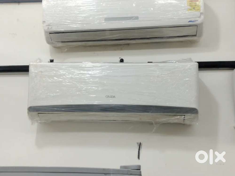 1 ton split AC good condition with warranty 1 year old