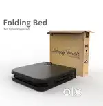 Single cot with cushion 8 months  used. Brand : Honey touch.