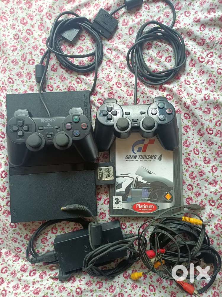 Sony PS2 with memory card, 2 joystick