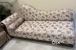 Side long sofa cum bed with cushion