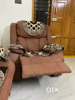 2 recliners and a triple seater sofa