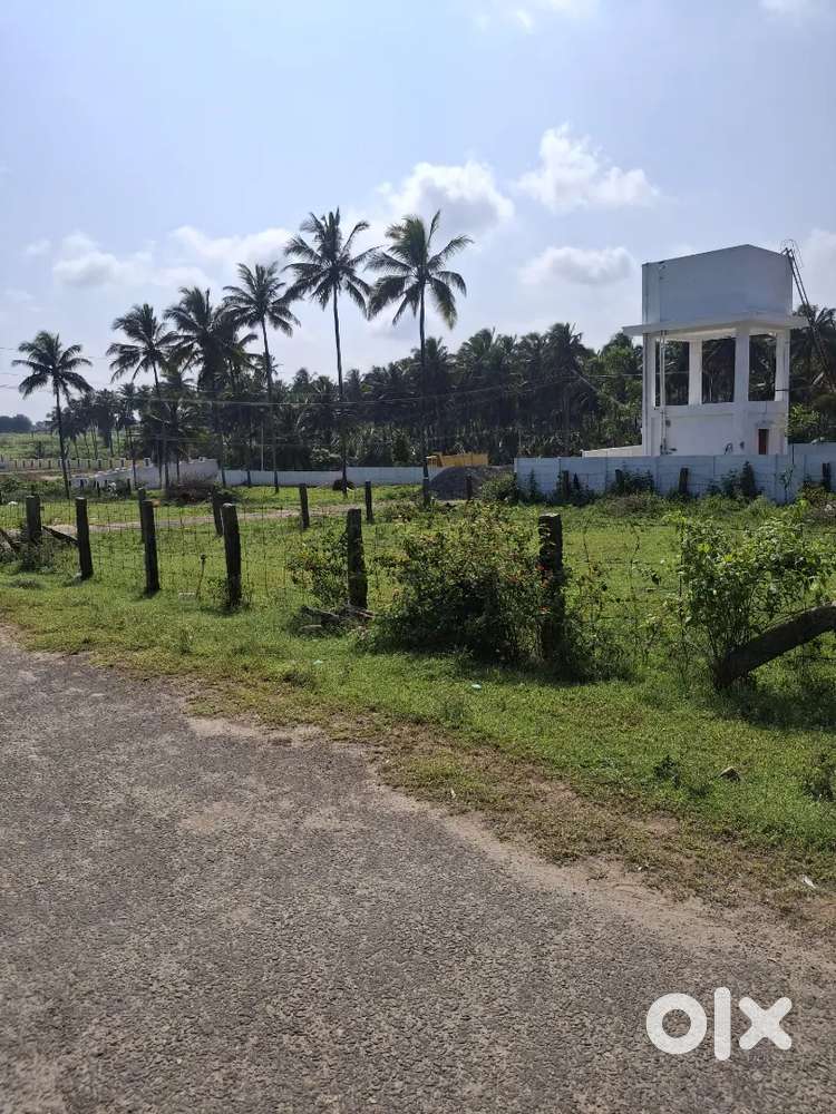 Polllachi main road north east corner site