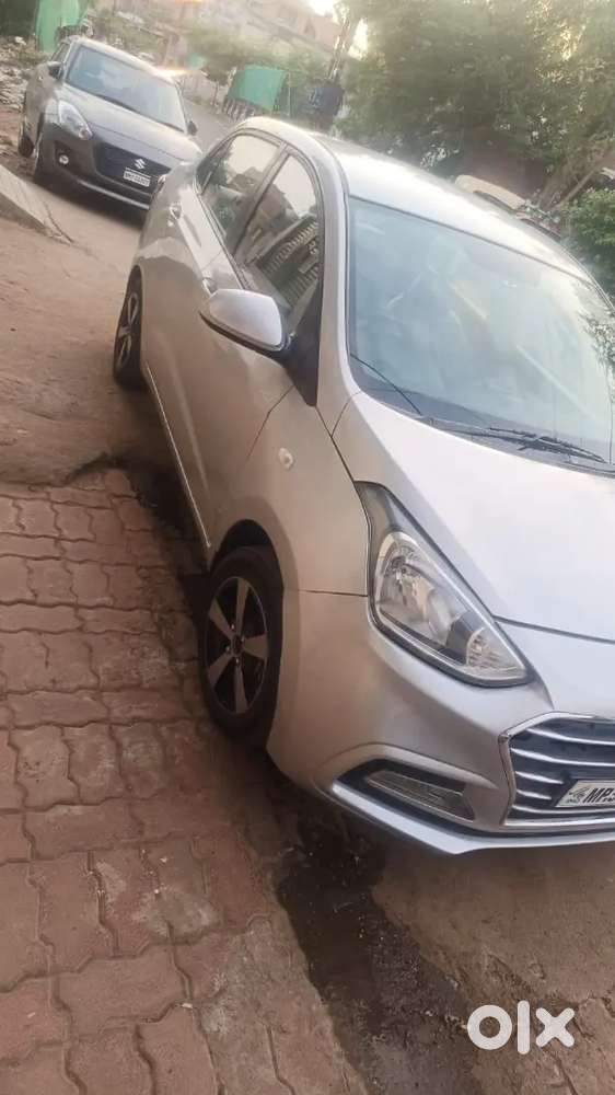 Xcent desile 1ownee alloy wheel milage 24kmpl