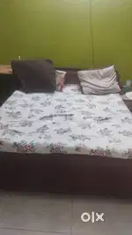 Double bed with mattress and almirah