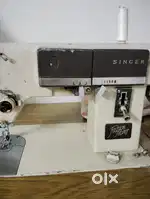 Sewing machine siger fashion maker with leg opeting table