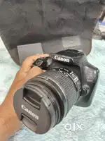Canon 1300d with 18-55 lens and battery charger strap bag and memory