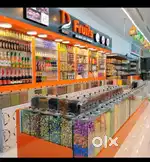 SALESMAN IN DRYFRUITS SHOP