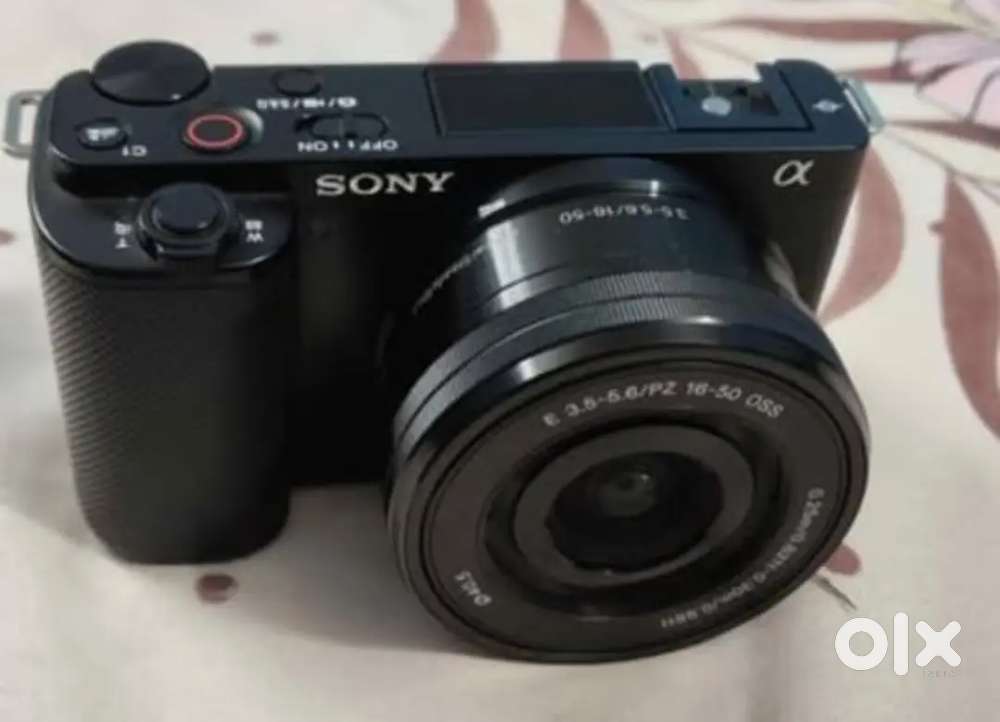 Sony Zve10 with kit lens 16-55 in excellent condition fix price