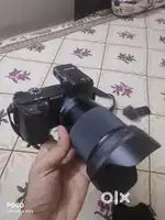 Sony @6400 with sigma 16mm and wireless sony mic.