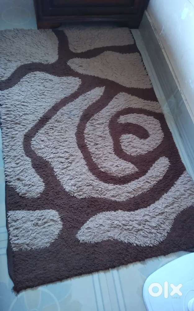 Two carpets of different sizes
