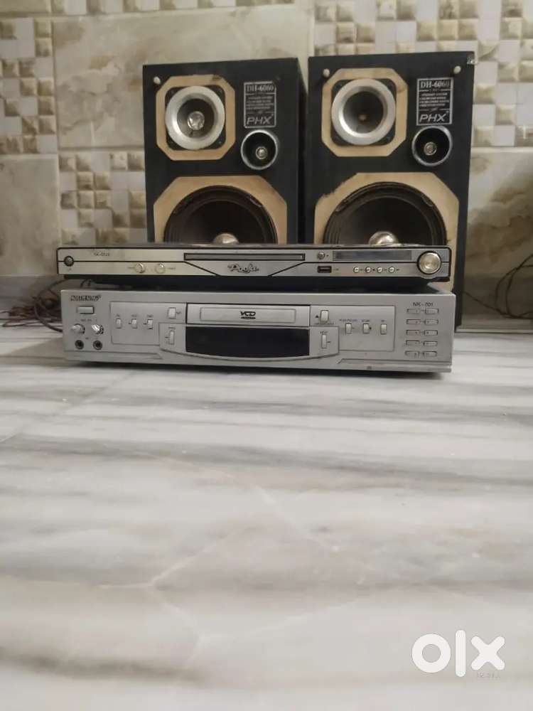 2 Speakers and 1 CD and DVD Player and 1 VLC player
