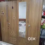 2 no: of four door steel almirah wooden finish with 2 mirror & drawer