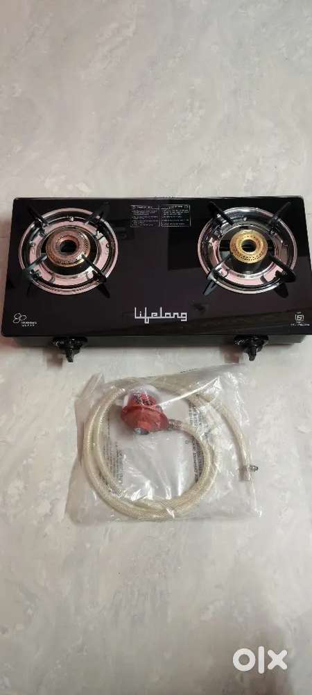 Two burner stove with gas pipe and regulator