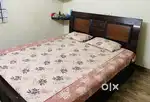 King size cot and mattress with curvy back support and storage