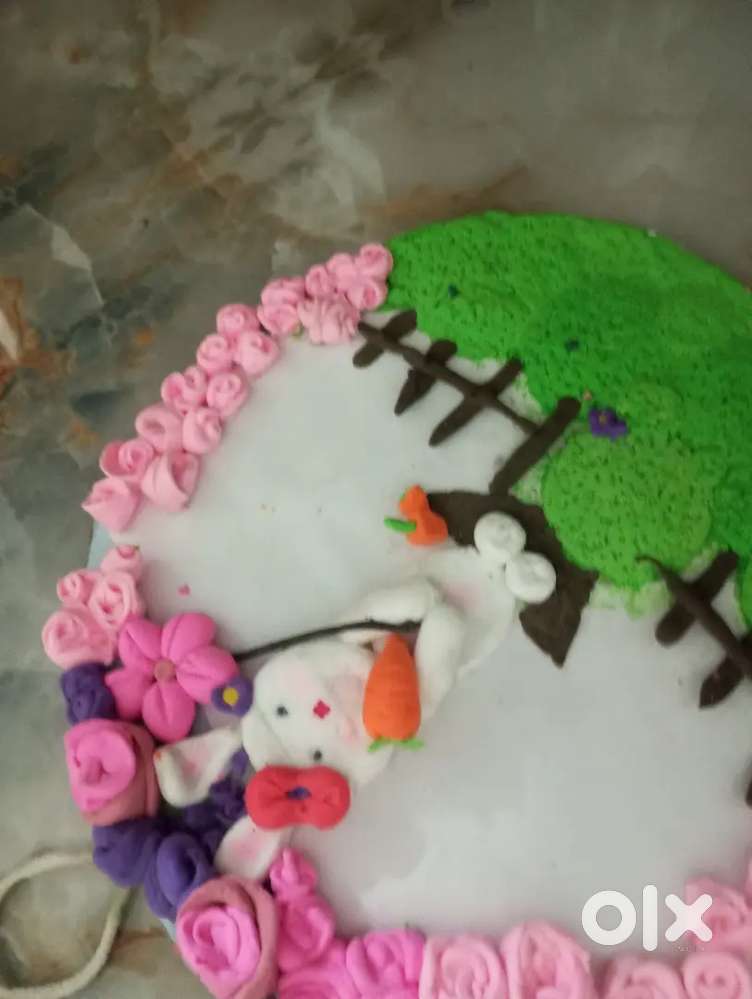 Iam selling a clay art of a bunny  with a carrot with some  flowers