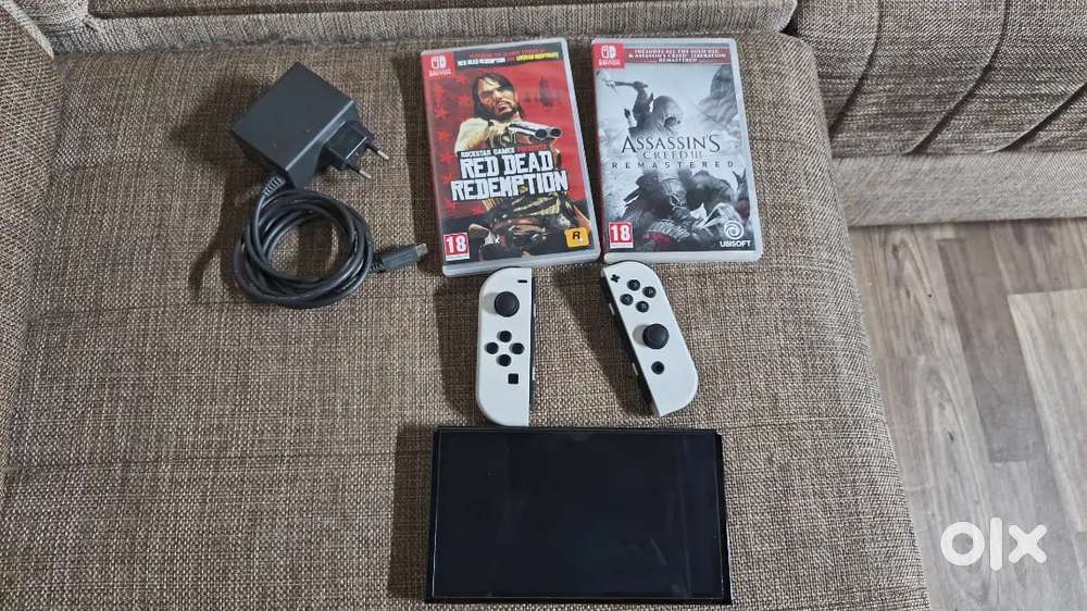 Nintendo Switch oled with rrd and assasincreed 3 (rm)