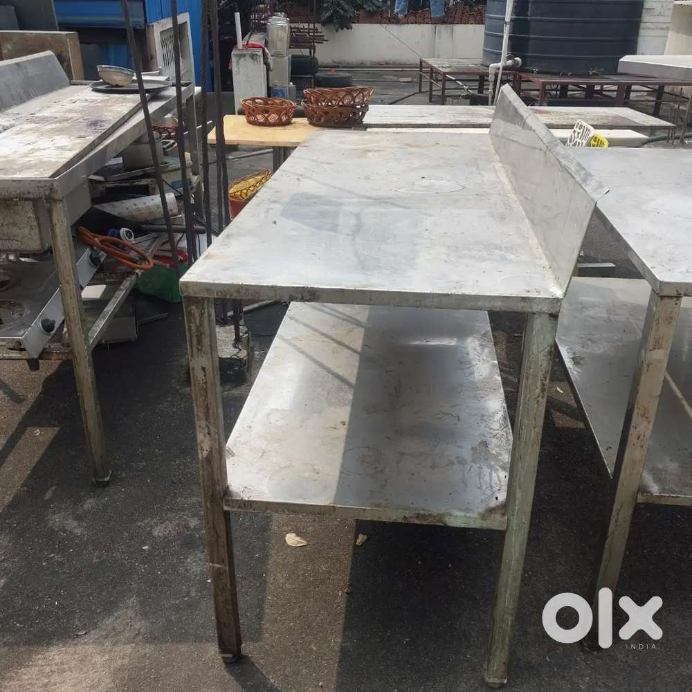 Cafe equipment steel tables and fridges and deep freezers