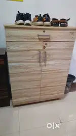 Storage cabinet with 4 wheels.