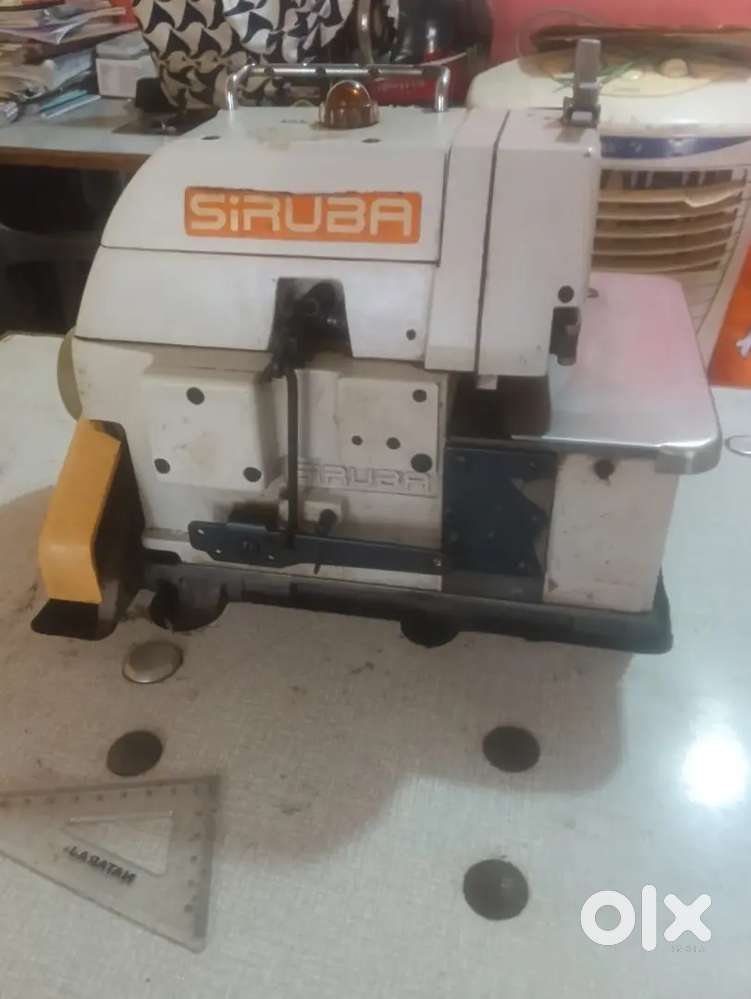 Sewing interlock machine